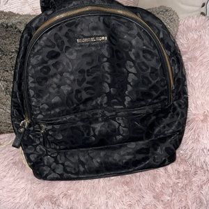 Michael Kors black w gold accents leopard print backpack